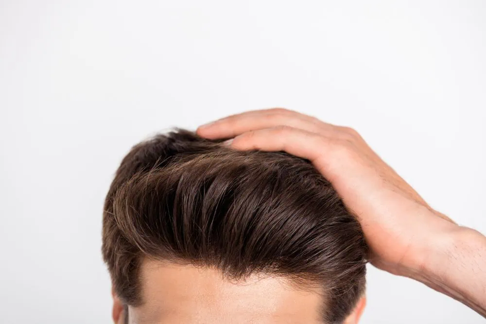Man's hairline Hair Restoration at Emerge Aesthetics