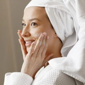 A woman doing her skincare