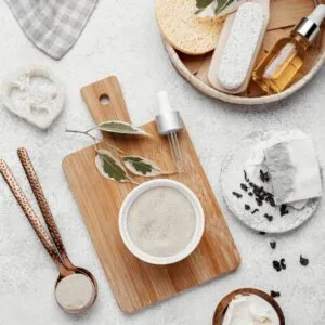 Flat lay of natural skincare products and tools.