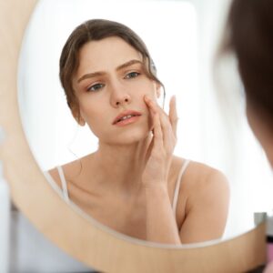 Woman's smooth skin during the laser skin resurfacing healing process after CO2 laser treatment